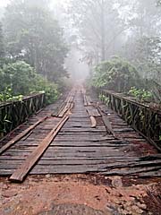 'A rotten, wooden Bridge on the way up to Kirirom Mountain' by Asienreisender