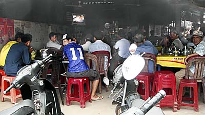 Cambodian TV in a Public Restaurant by Asienreisender