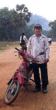'Moto Driver at Phnom Banan' by Asienreisender