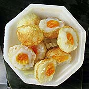 'Quail Eggs on Yasothon's Night Market' by Asienreisender