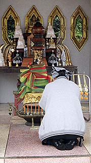 'Someone Praying at the City Pillar Shrine' by Asienreisender