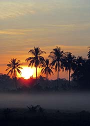 'Sunrise over Chum Phae' by Asienreisender
