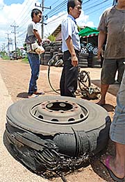 'Broken Tyre of a Bus' by Asienreisender