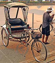 'A Bicycle Rikshaw Driver in Mae Sai' by Asienreisender
