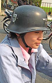 'Thai Woman with a Nazi Helmet in Chiang Rai' by Asienreisender
